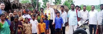 Chris Lawson with Sam A.M. and jungle village people in South India