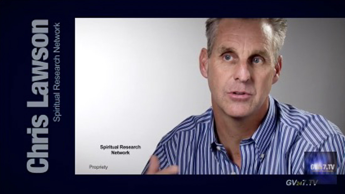 Video screenshot image of Chris Lawson in studio with white background